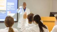 Professor giving a lecture to a class.